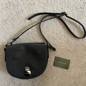 Black longchamp crossbody with dark silver hardware